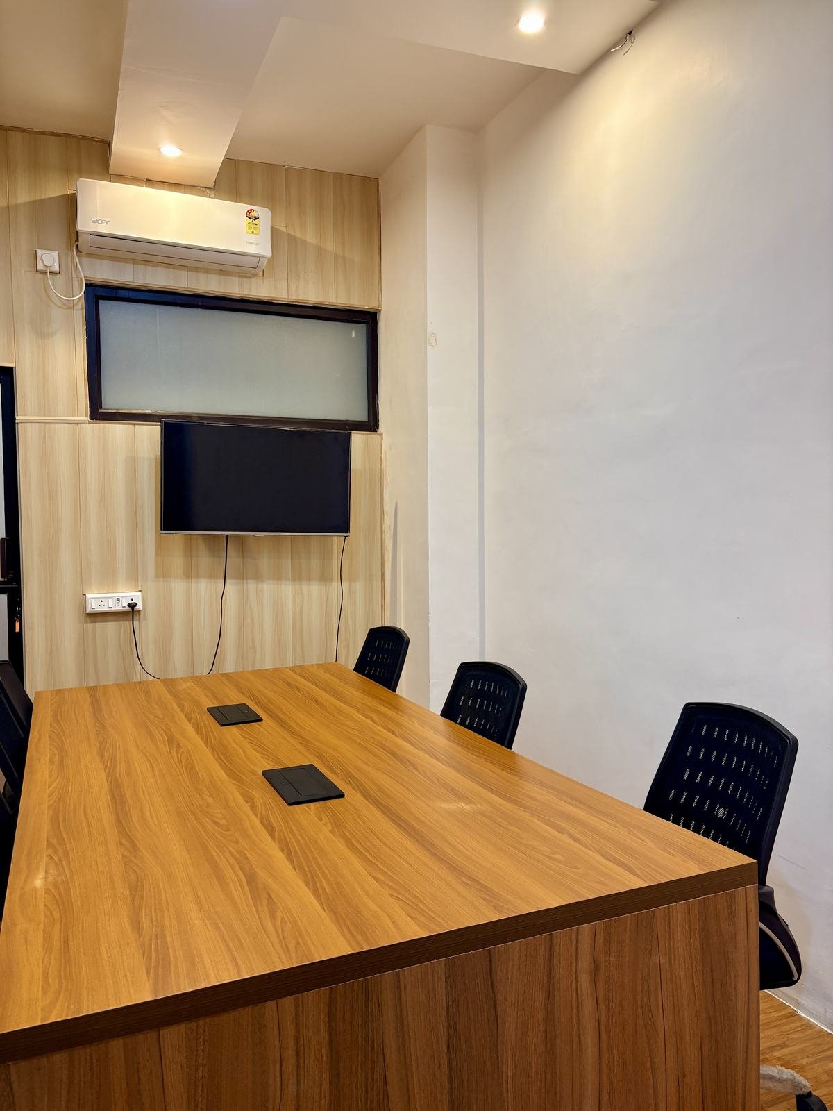 Conference room with large wooden table