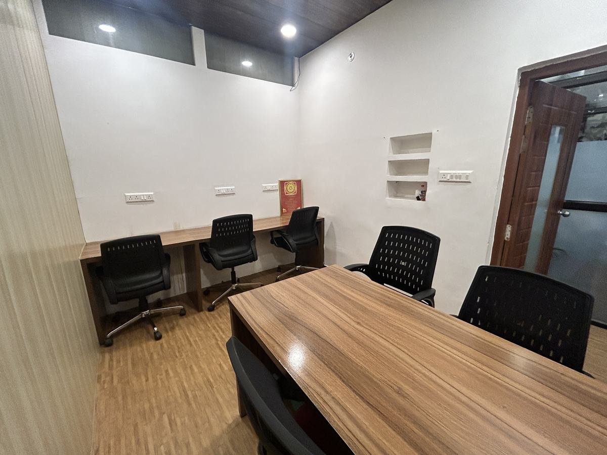 Open work area with long shared table